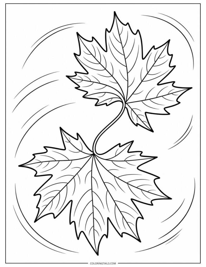 One leaf drifting downward in a graceful spiral.