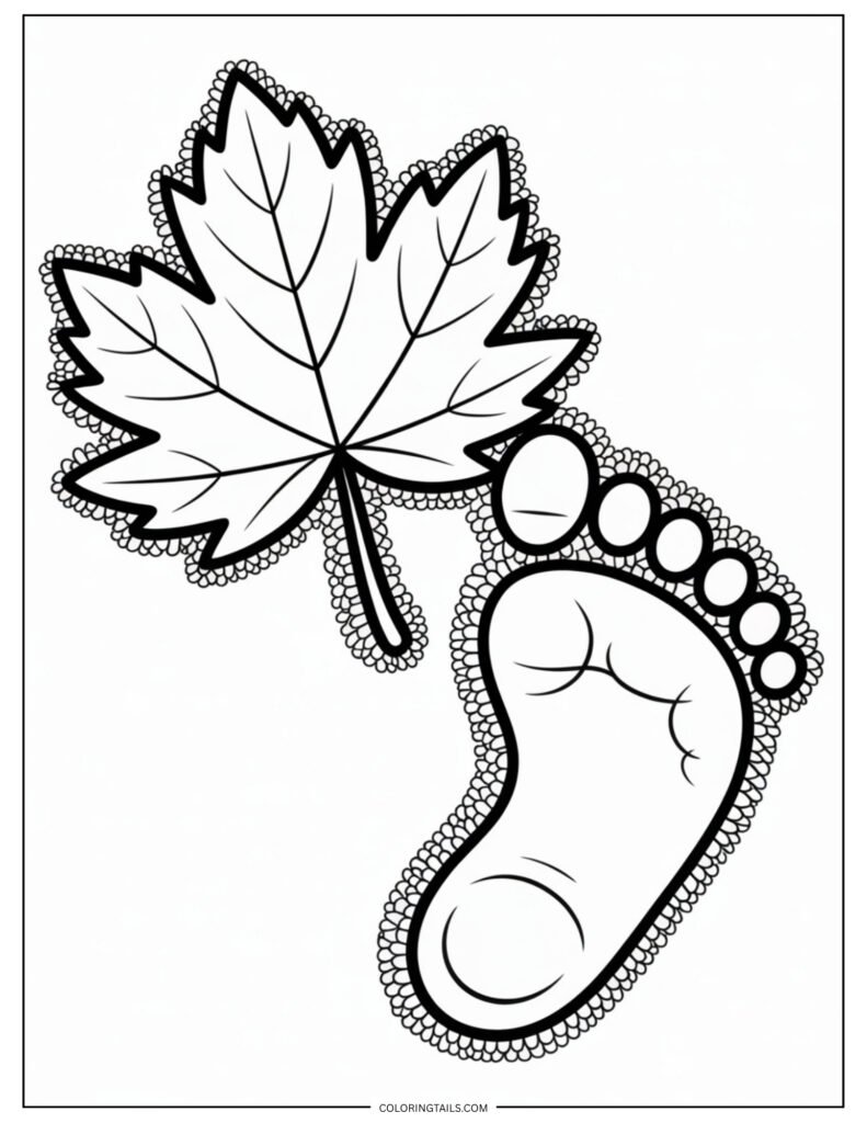 A single leaf next to a child’s barefoot print in the dirt.